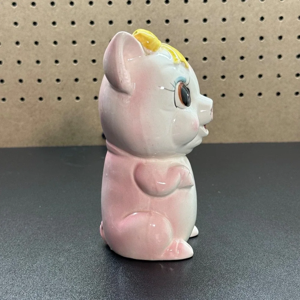 Vintage Japanese Ceramic Piggy Bank with Winking Expression And a Yellow Bow - Picture 4 of 11